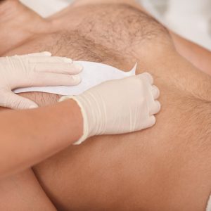 ÉPILATION À LA CIRE  DOS OU TORSE